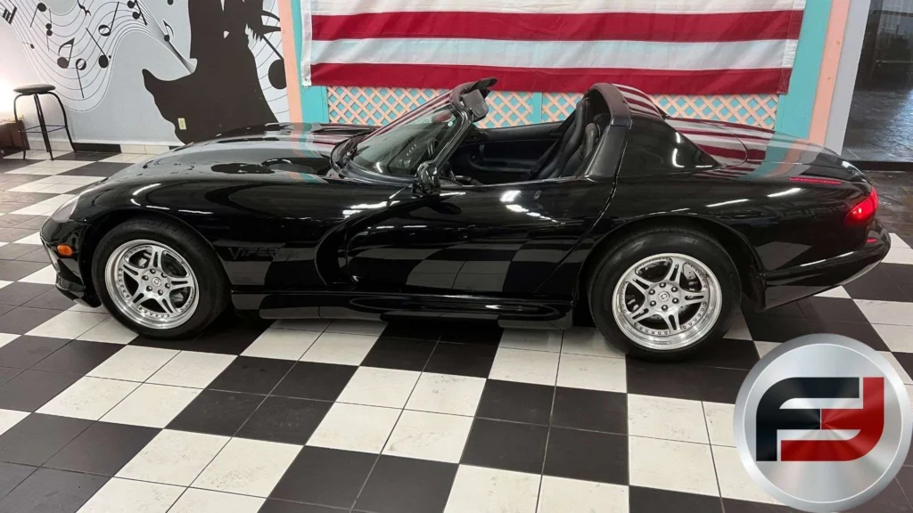 Side profile of black 1996 Dodge Viper RT/10 roadster