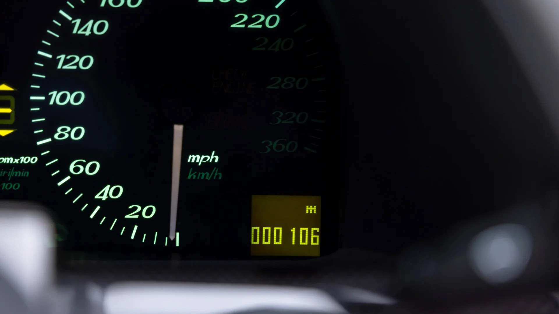 Instrument cluster of the 106-mile 1997 Ferrari F50 showing the odometer