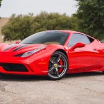 Red 2014 Ferrari 458 Speciale front three-quarter view