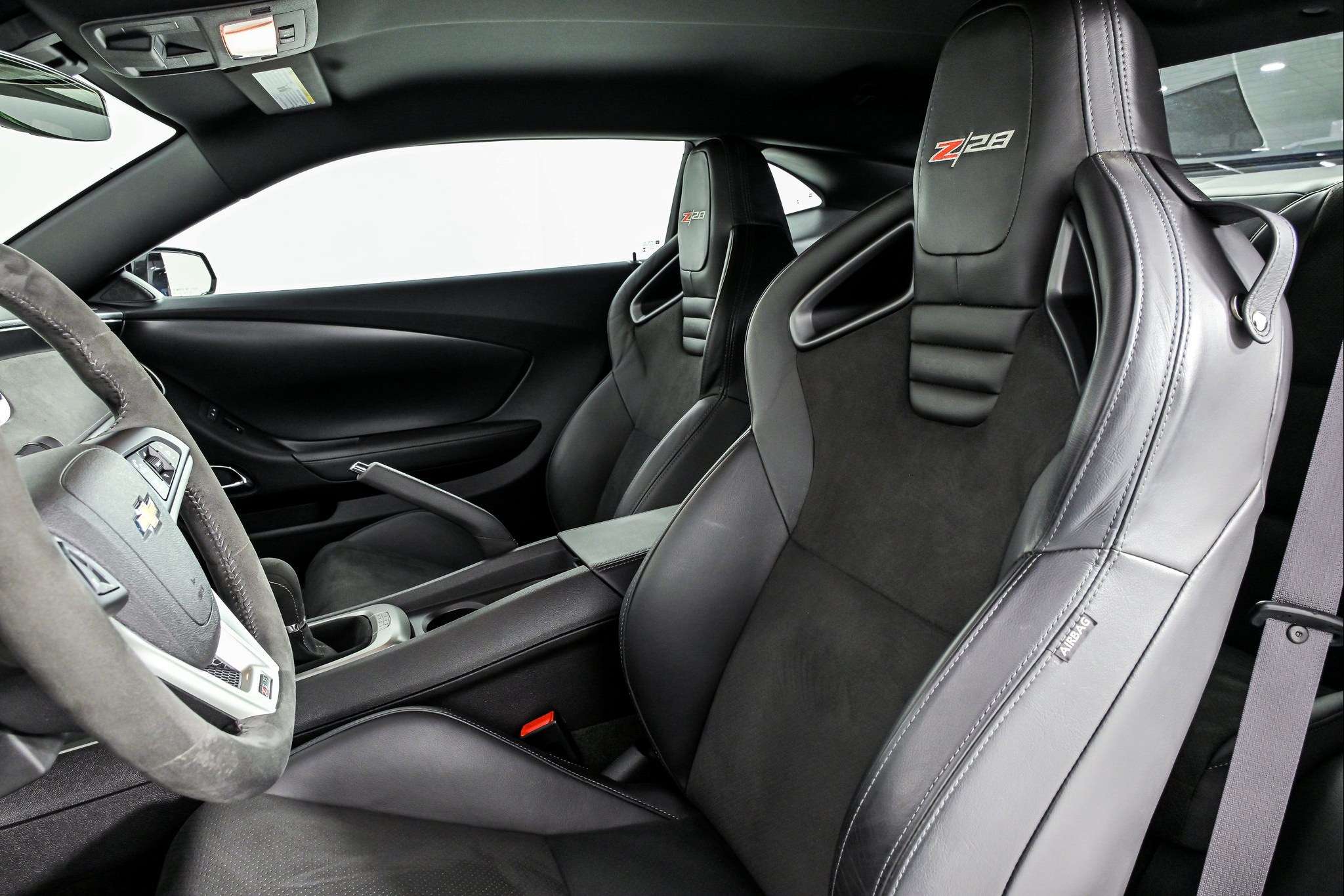 Recaro front seats and sueded microfiber interior of a 2015 Camaro Z/28 without air conditioning