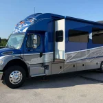 For Sale at Freije & Freije Auctioneers: 2017 Dynamax DX3 37TS Super C Motorhome Front three-quarter view of the 2017 Dynamax DX3 37TS motorhome offered by Freije & Freije Auctioneers