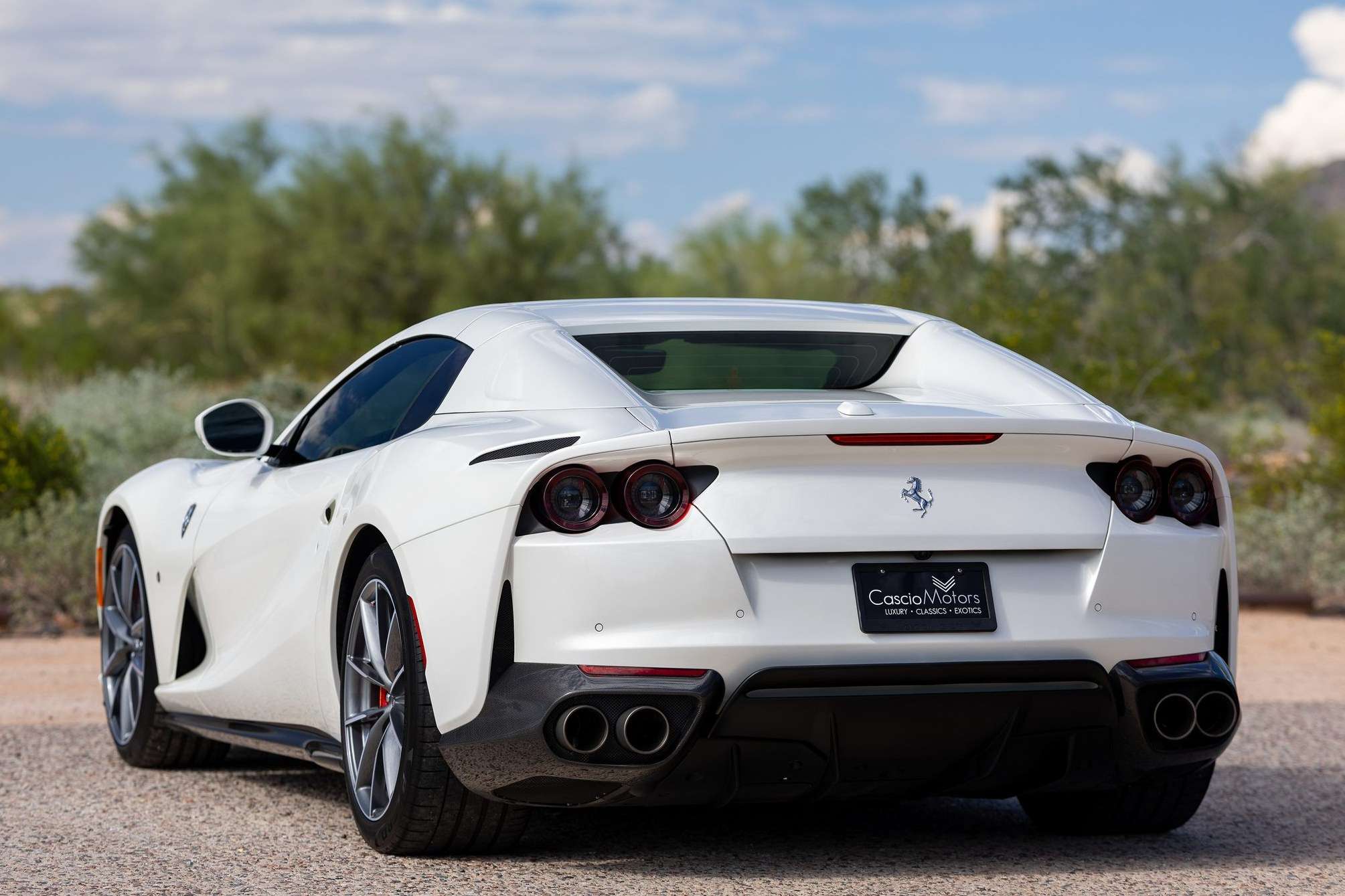 Rear view of the 2021 Ferrari 812 GTS showing quad titanium exhaust outlets