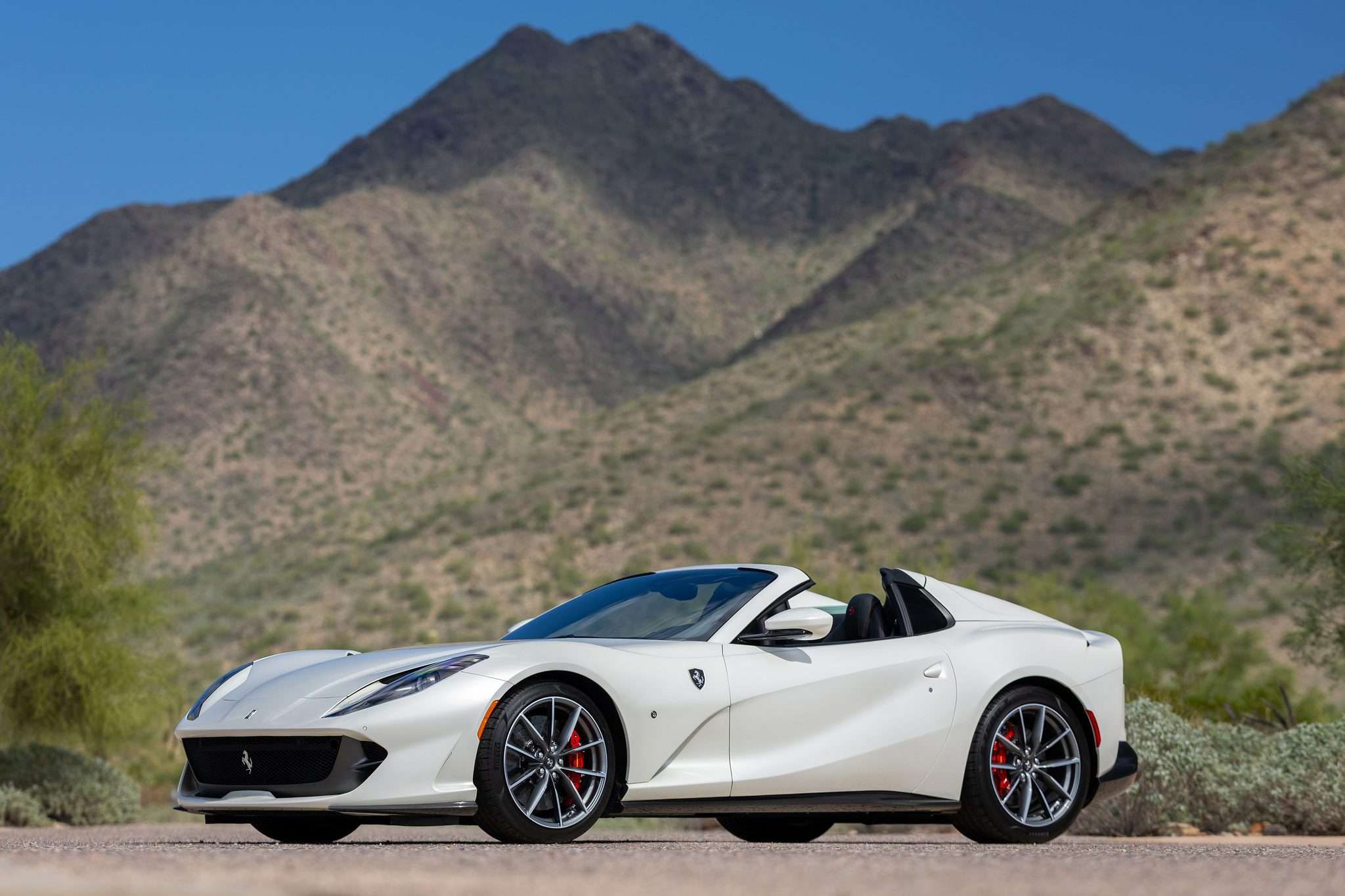 Rear three-quarter profile of the 2021 Ferrari 812 GTS against Arizona mountains