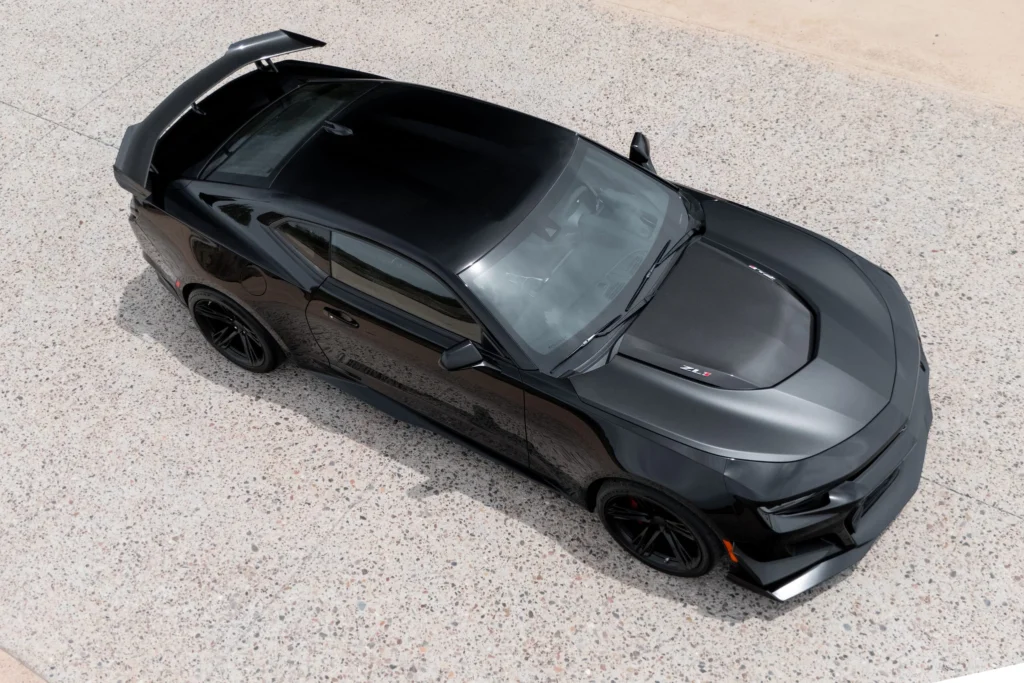 Aerial view of a 2023 Camaro ZL1 1LE showing the satin black hood and carbon-fiber insert