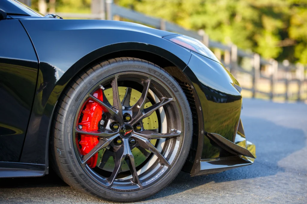 Visible carbon fiber wheel and red carbon ceramic brake caliper on the 2026 Corvette ZR1