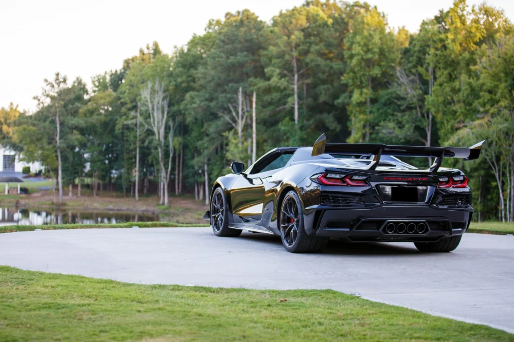 Rear three-quarter view of the 2026 Corvette ZR1 convertible showing the carbon fiber high wing