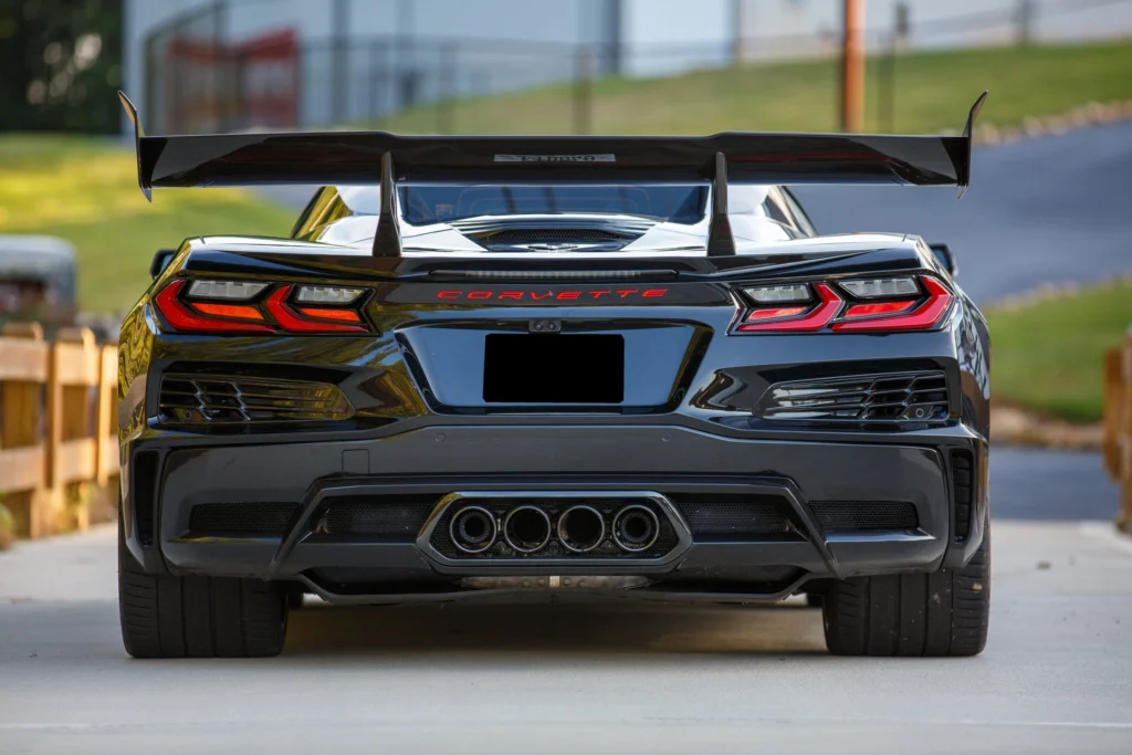 Rear view of the 2026 Corvette ZR1 with black exhaust tips and high-wing spoiler
