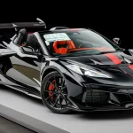 Black 2027 Chevrolet Corvette ZR1X convertible on a display platform, sold for $441,000 on Bring a Trailer