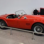 Lot of the Day: A 1965 AC Cobra 289 Crosses the Block at Zoute, and Its Conversion Is the Question 1965 AC Cobra 289 roadster parked outdoors