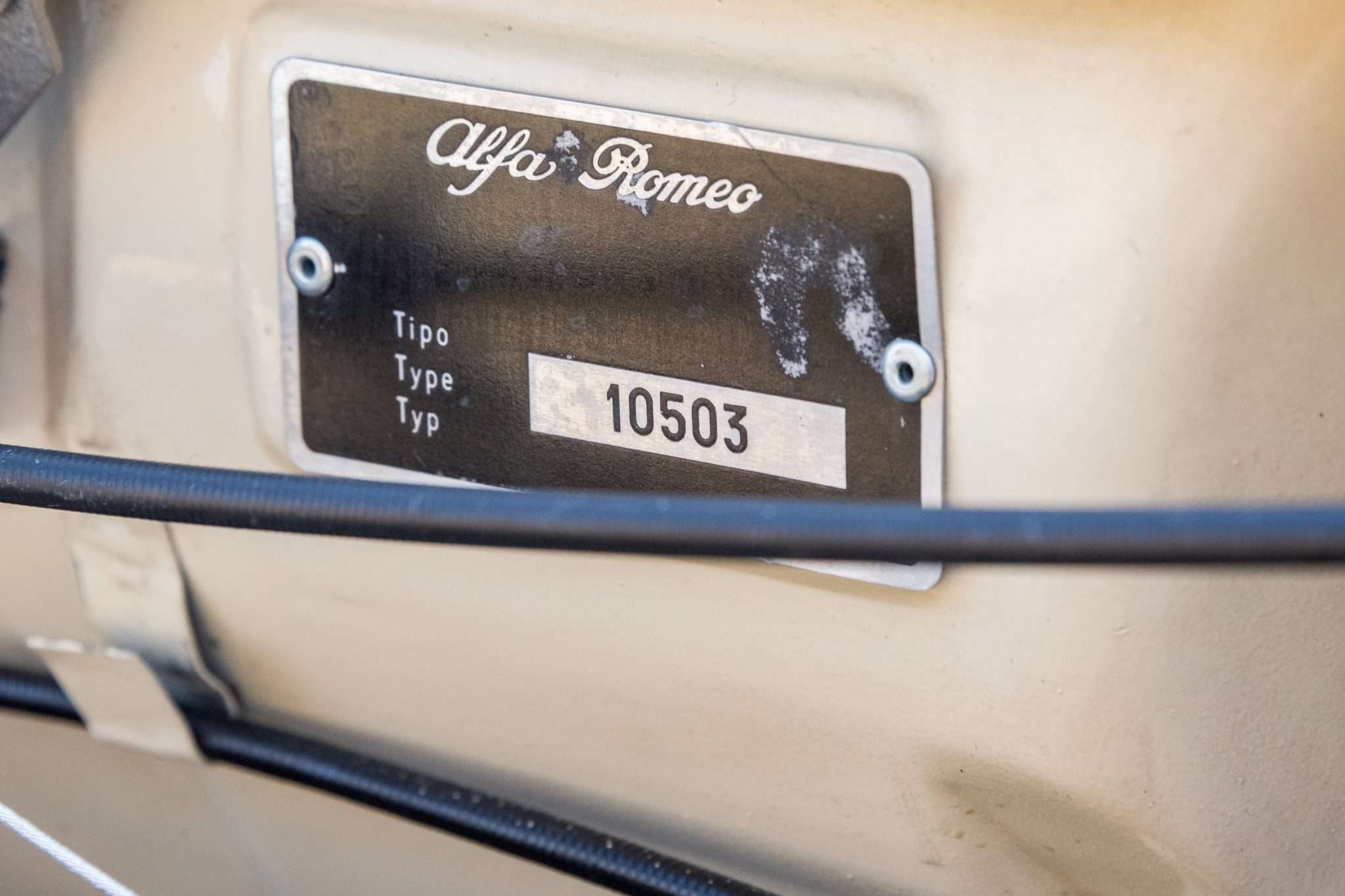 Alfa Romeo data plate reading Tipo 10503 on a 1966 Alfa Romeo 1600 Spider
