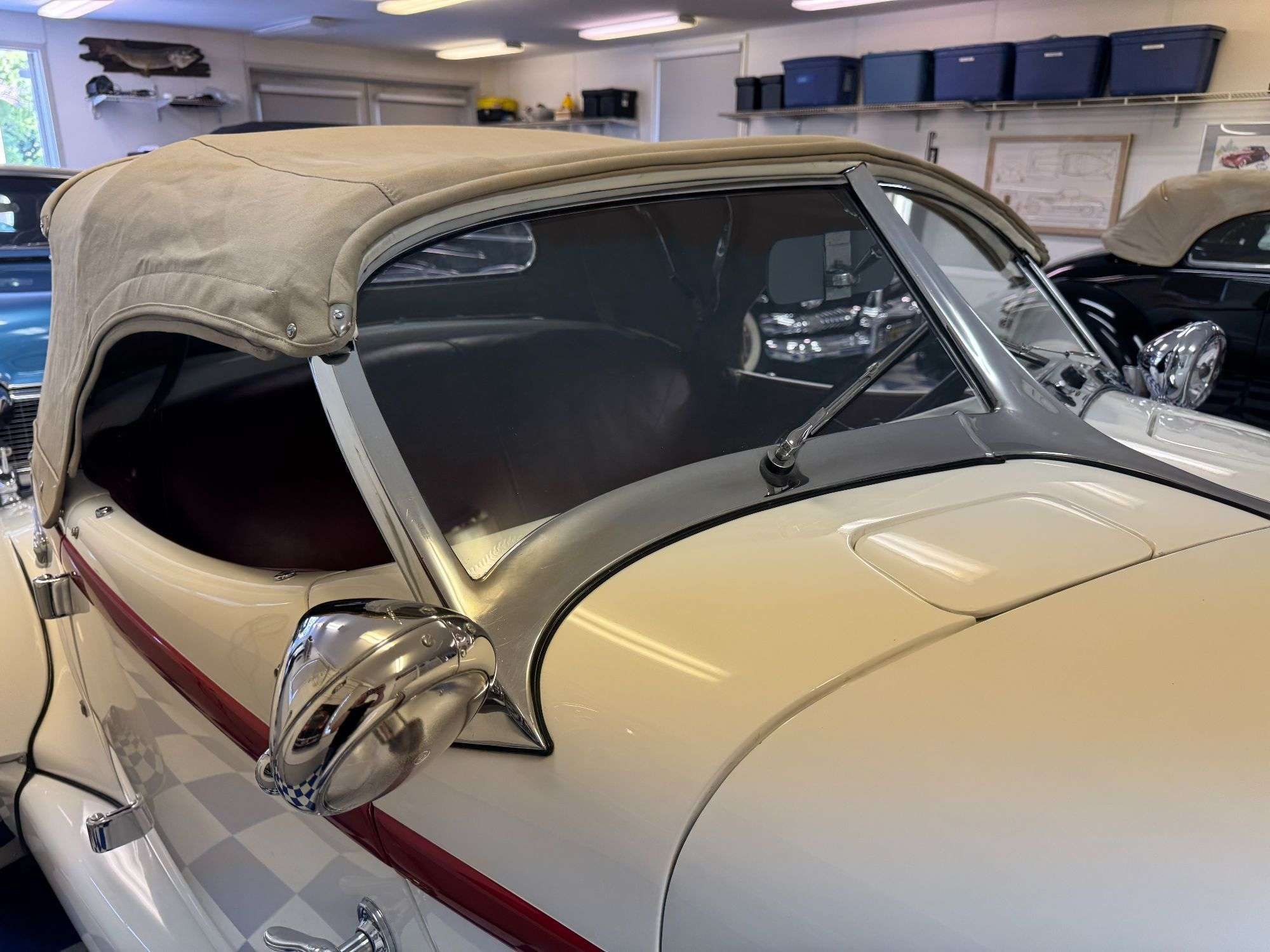 1936 Auburn 852 Speedster with its tan convertible top raised