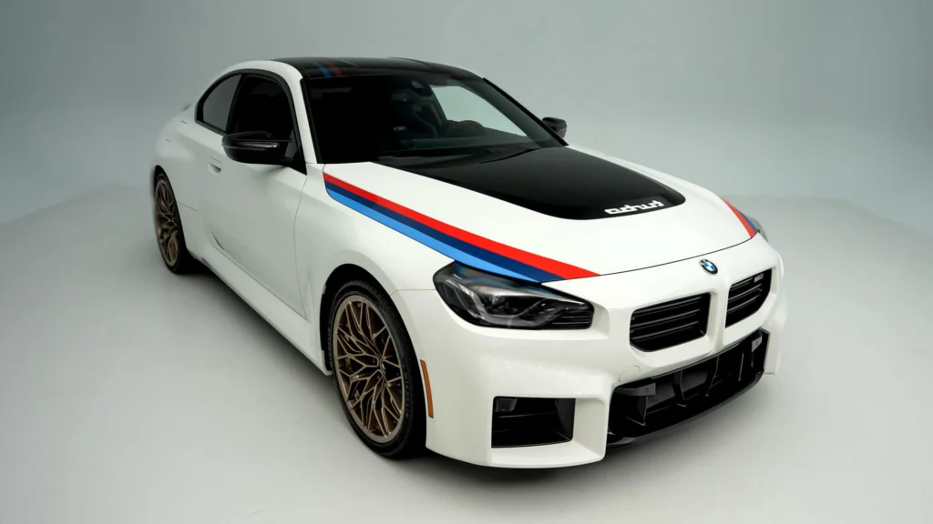 2026 BMW M2 Turbo Design Edition showing black hood power dome with reverse turbo script