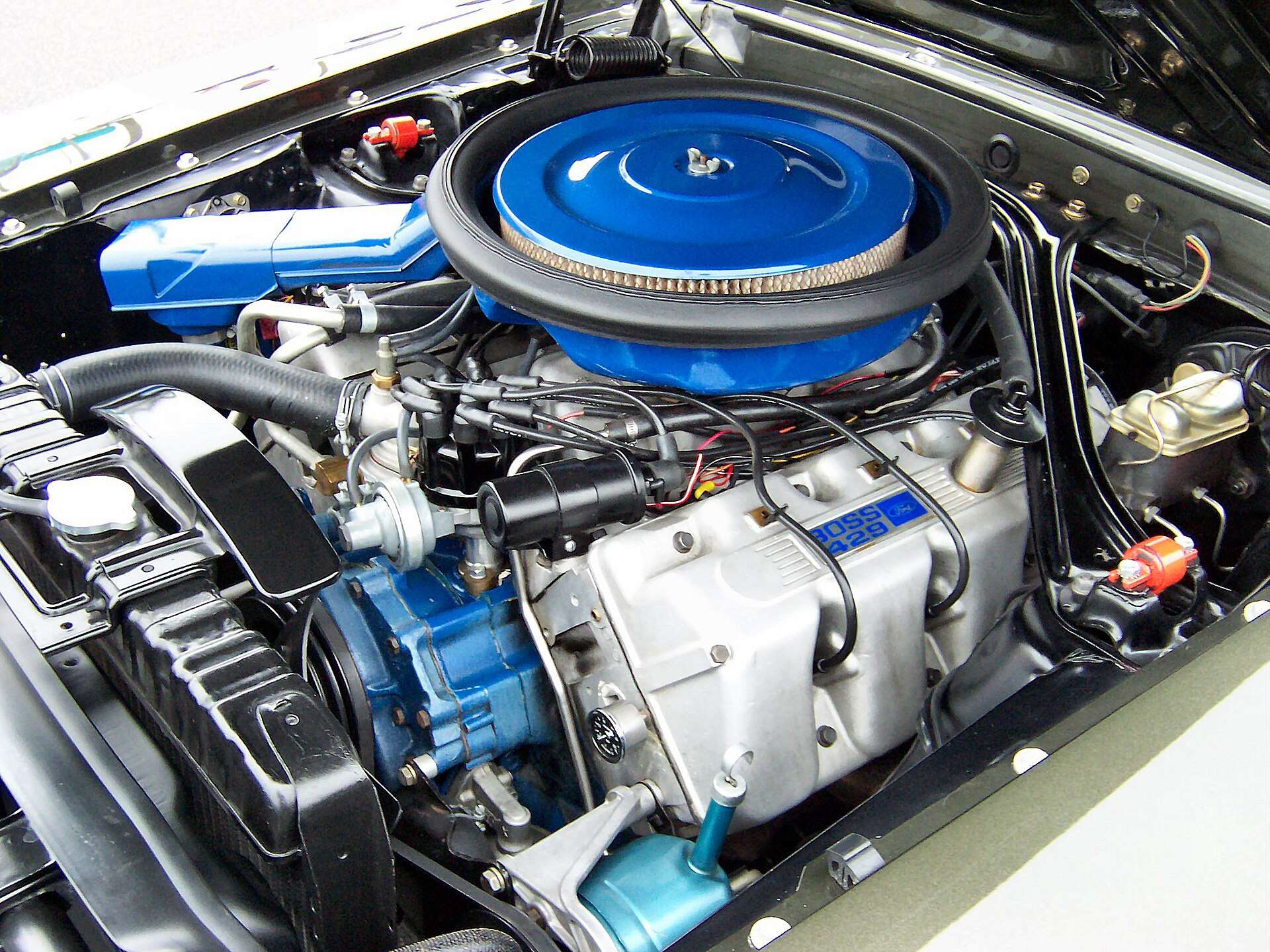 Boss 429 semi-hemi engine filling the widened engine bay of a Ford Mustang Boss 429