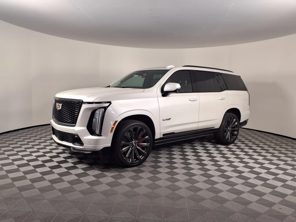 Standard Cadillac Escalade-V full-size luxury SUV parked in a lot, shown before the Collector Series edition
