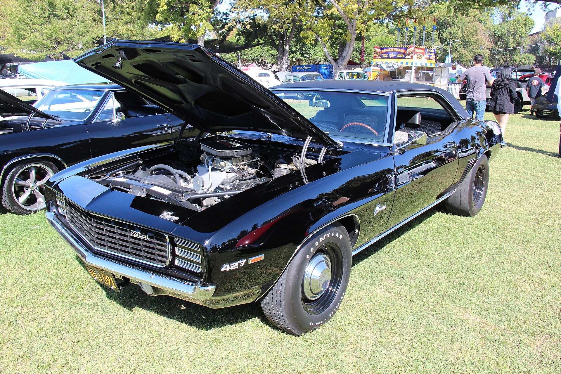 Black 1969 Chevrolet Camaro COPO 9560 ZL1 with the hood open showing the aluminum 427 engine