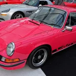 Porsche 911 Carrera RS 2.7 Collector Spec Sheet: Production, Options, Weak Points and Value Red 1973 Porsche 911 Carrera RS 2.7 Touring (M472) with black Carrera side script, front three-quarter view