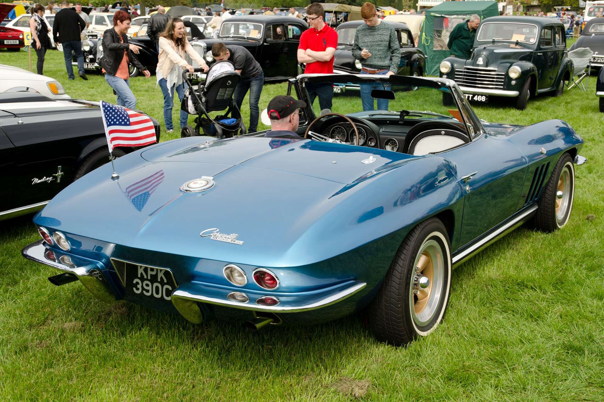 Blue 1965 Chevrolet Corvette Sting Ray C2 convertible parked at a car show