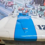 The $18.7 Million Corvette Grand Sport Repriced a Car, Not a Marque 1963 Chevrolet Corvette Grand Sport with blue stripe and number 12 on display at a museum