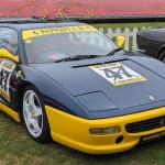 A 1997 Ferrari F355 Berlinetta in three-quarter view