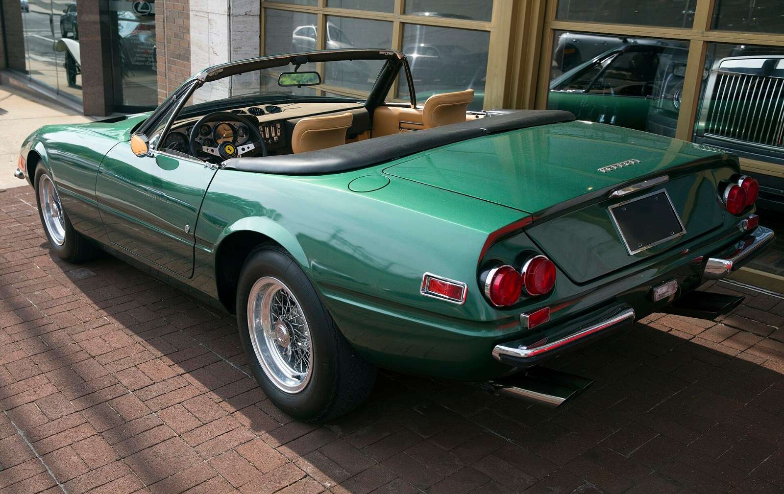 Rear three-quarter view of a US-specification 1973 Ferrari Daytona Spyder in Verde Pino