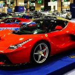 Collector Car Market Brief: A Belgian Record at Zoute, and Why the Cobra Went Home Ferrari LaFerrari hybrid hypercar on display at Rétromobile in Paris
