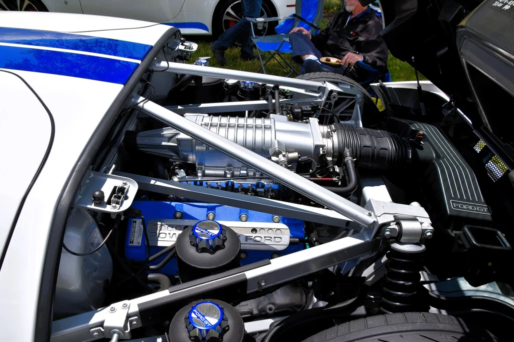 Supercharged 5.4-liter DOHC V8 engine bay viewed through the rear clamshell