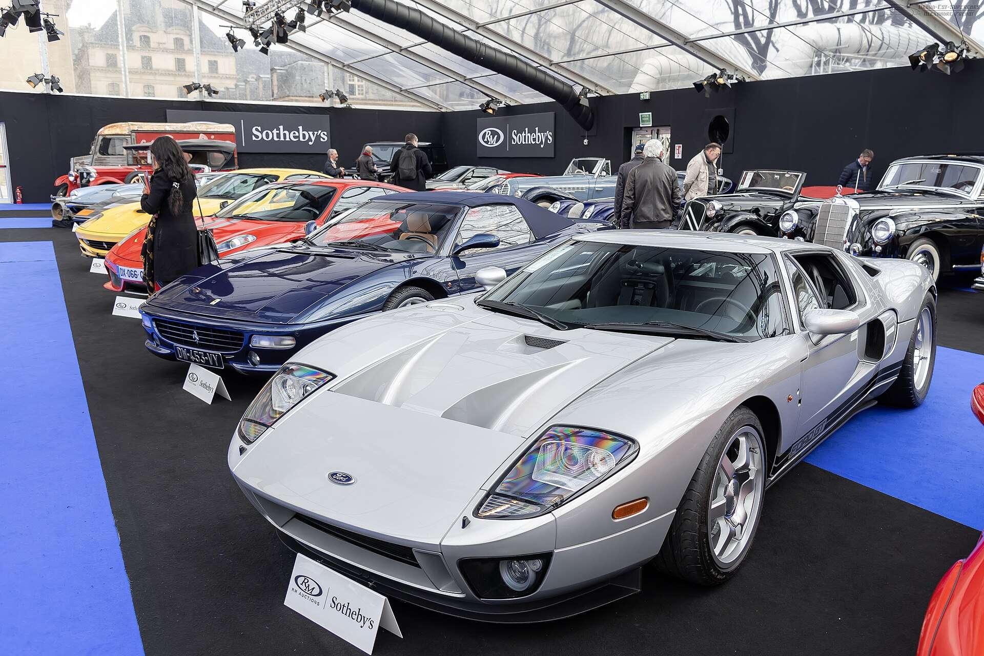 Silver first-generation Ford GT displayed at an RM Sotheby's auction preview
