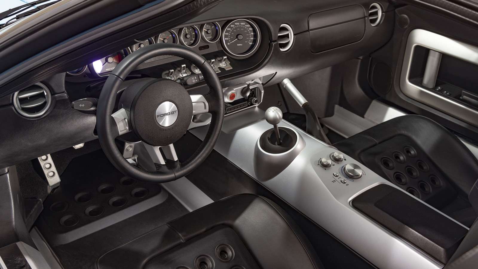 Ford GT Heritage Edition interior with six-speed shifter and analog gauges