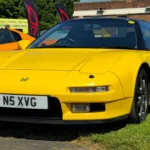 Yellow first-generation Honda NSX, the donor car type for the JAS Tensei restomod
