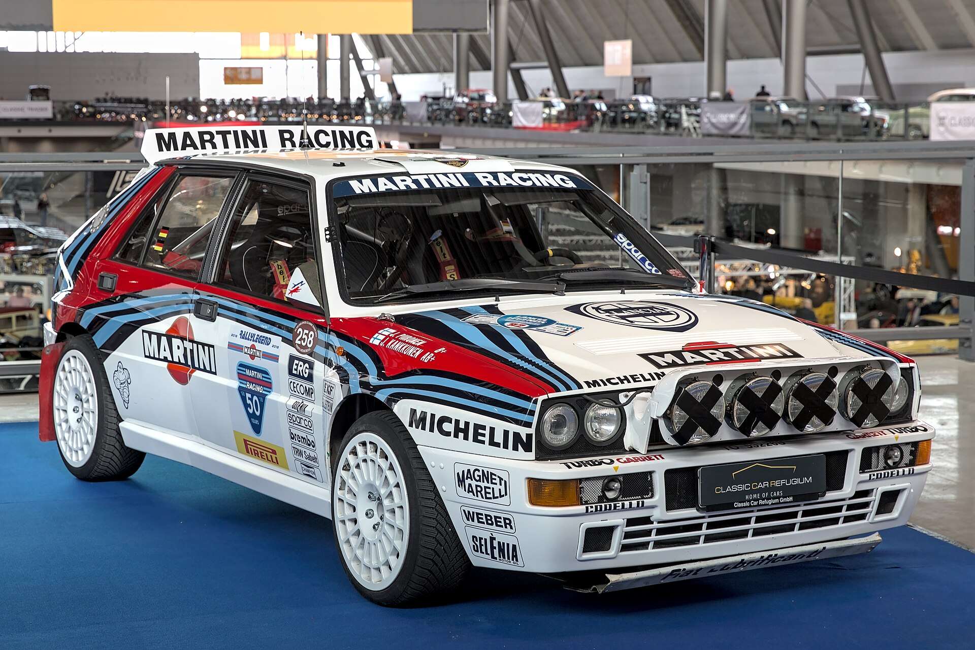 Lancia Delta HF Integrale Evoluzione Group A rally car in white Martini Racing livery on display at Retro Classics