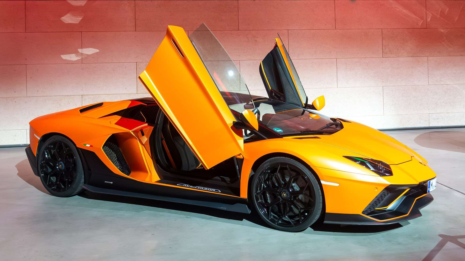 A Lamborghini Aventador parked at a car meet in Munich