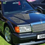 190E Evo II vs. Sierra RS500 vs. M3 Sport Evolution: Three Touring-Car Homologation Specials, Three Very Different Markets Blue-black 1990 Mercedes-Benz 190E 2.5-16 Evolution II seen from the front three-quarter, showing its flared fenders and deep front splitter