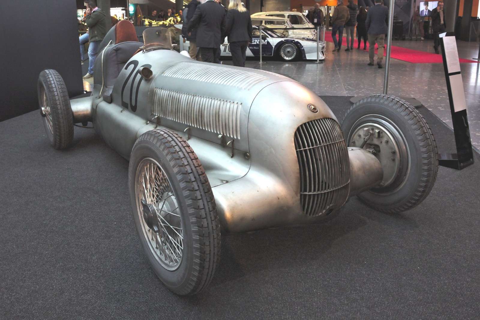 Polished-aluminum 1934 Mercedes-Benz W 25 Grand Prix car, number 20, shown at Retro Classics 2018