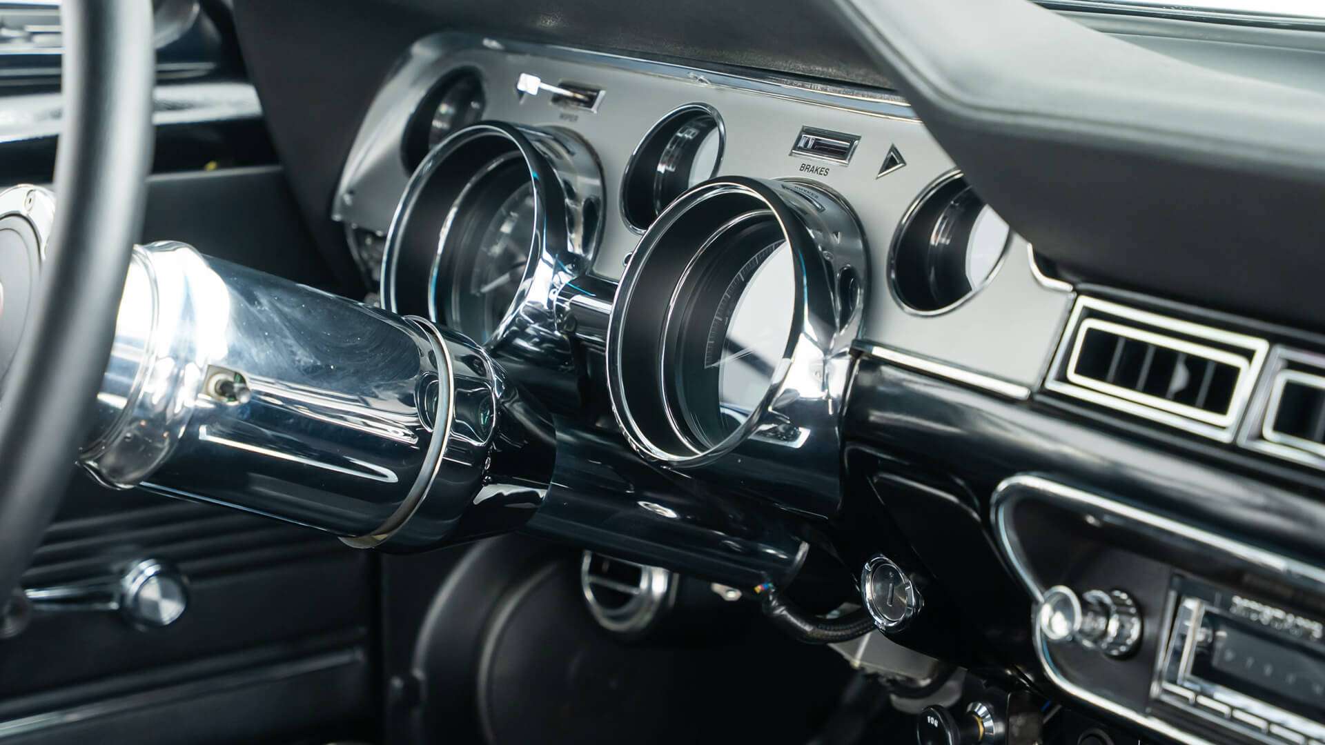 Dakota Digital VHX gauges and polished steering column in the 1968 Mustang restomod