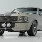 1968 Eleanor-style Mustang restomod in Pepper Gray Metallic, front three-quarter view