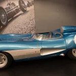 Blue Corvette racing prototype with a large number 1 roundel on display inside the National Corvette Museum in Bowling Green, Kentucky