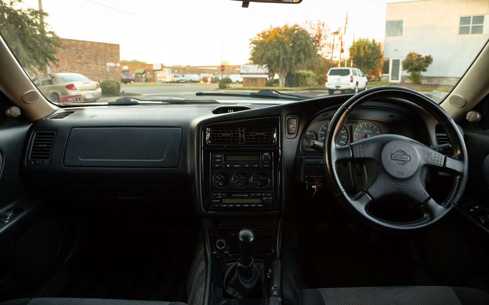 Right-hand-drive dashboard and five-speed manual shifter of a 1998 Nissan Stagea 260RS Autech Version