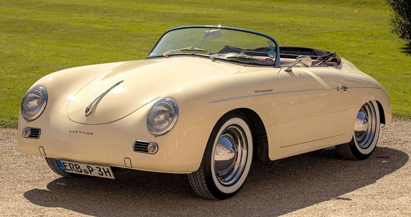 Porsche 356 A Speedster with its low raked windshield and rounded Reutter bodywork parked at the 2021 Classic-Gala event