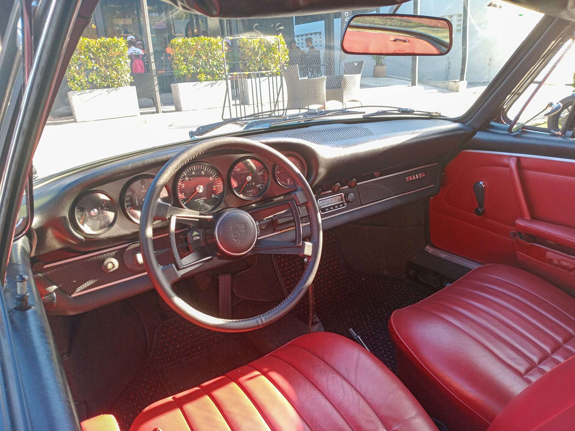 Dashboard and interior of a 1968 Porsche 911S Targa with original-style gauges