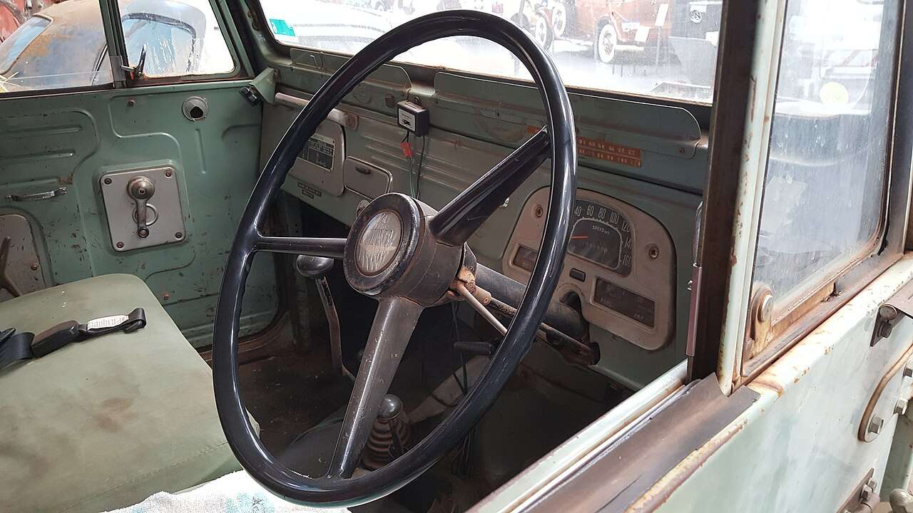 Painted metal dashboard, gauges and transfer case levers of a 1971 Toyota Land Cruiser FJ40