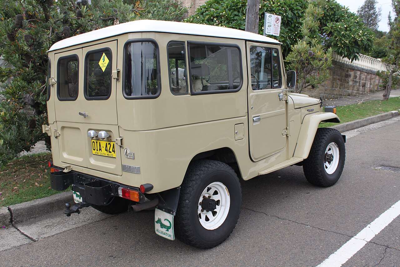 1980 Toyota Land Cruiser FJ40 hardtop with square-bezel grille photographed from the front three-quarter