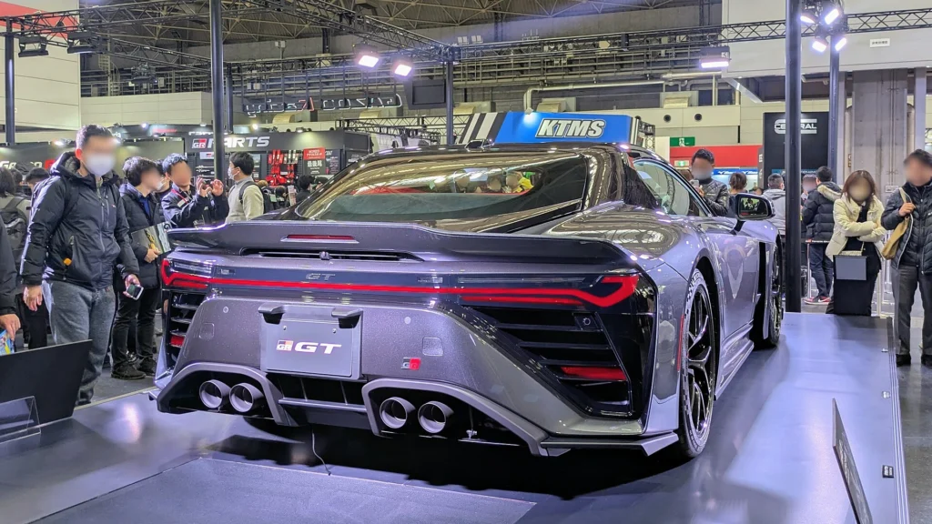 Rear three-quarter view of the Toyota GR GT prototype hybrid V8 supercar at Osaka Auto Messe 2026